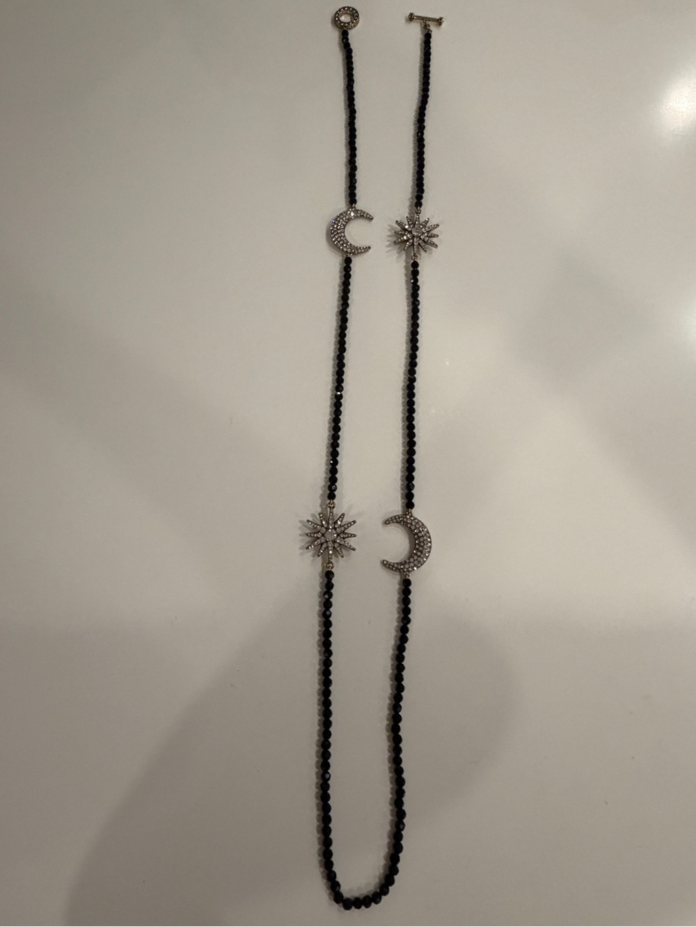 Vintage Heidi Daus Elegant Black Bead Necklace with Crescent Moon & Star Accents